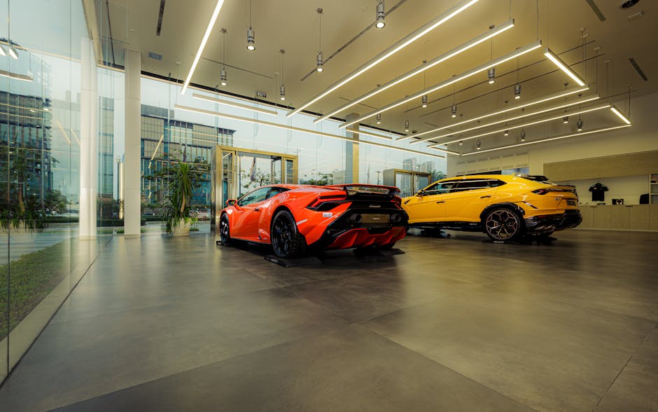 Showroom featuring luxury sports cars, Lamborghini models, with sleek design and modern architecture
